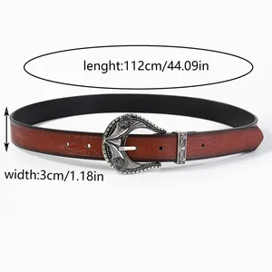Detailed view of vintage embossed leather belt with 112cm length and 3cm width measurements