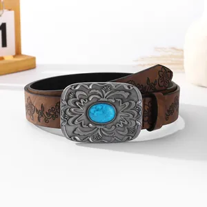 Vintage brown leather belt with turquoise buckle and floral patterns in western style
