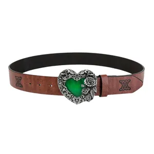 Vintage brown embossed leather belt featuring silver heart buckle with green gemstone