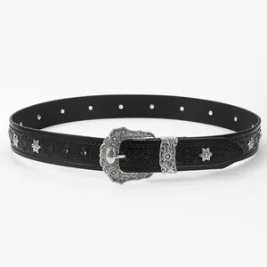 Close-up of vintage black leather belt with silver star studs and engraved pin buckle