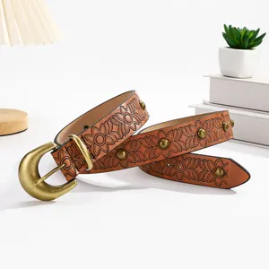 Vintage brown leather belt with floral embossing and bronze mushroom studs for women