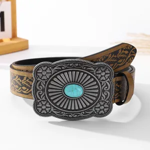 Vintage leather belt with embossed floral pattern and turquoise stone metal buckle
