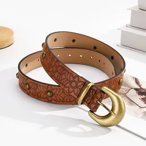 Vintage brown leather belt with floral embossing and bronze stud rivets for women