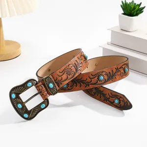 Vintage western cowboy leather belt with turquoise inlay and embossed floral patterns
