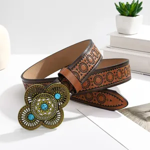 Bohemian vintage brown leather belt with turquoise buckle and sun pattern embossing