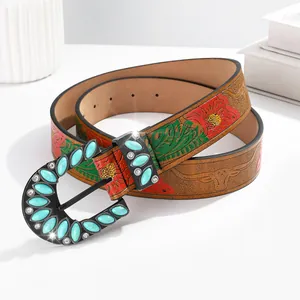Boho bruine lederen damesriem met bloemenprint en hoefijzergesp met turquoise steen