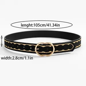 Detail view of black waist belt with gold wave embroidery and dual-ring buckle dimensions