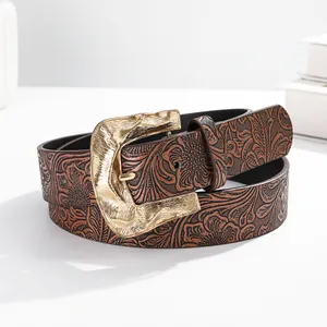 Vintage brown leather belt with floral embossing and a hammered gold buckle