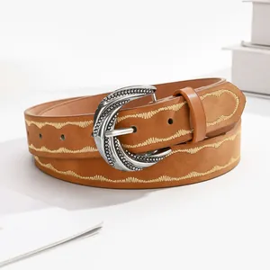 Ceinture en cuir marron avec broderie ondulée et boucle argentée vintage femme