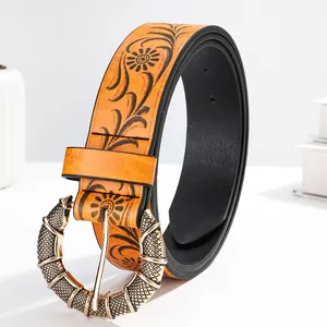Vintage Y2K bohemian embossed leather belt with yellow sunflower pattern and gold buckle