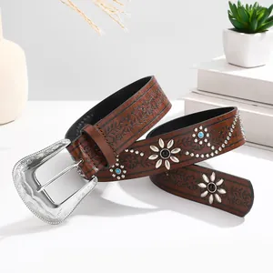Vintage brown leather belt with carved silver buckle and flower rivet decorations