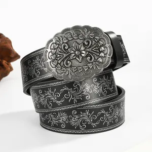 Ceinture punk Y2K vintage en cuir noir avec motif floral argenté et boucle gravée