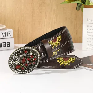 Vintage leather belt with ruby butterfly buckle and sunflower embossed floral patterns
