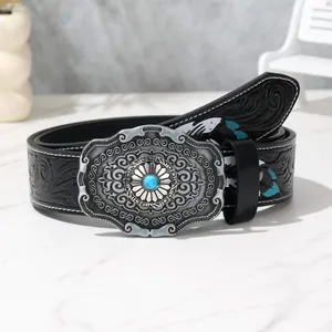 Ceinture noire de style western avec motifs embossés et boucle gravée en turquoise