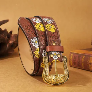 Vintage western brown leather belt with sunflower floral embossing and gold buckle