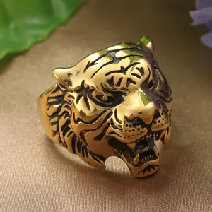 Vintage punk tiger head ring in gold finish with intricate texture and retro style