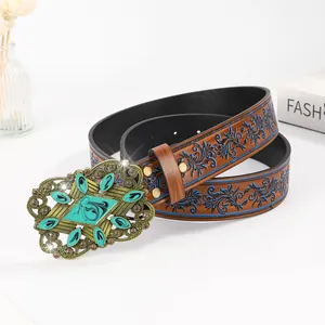Vintage western bohemian leather belt with turquoise buckle and floral embossed patterns