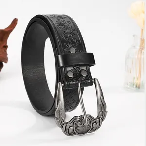 Bohemian vintage black leather belt with turquoise-style buckle and floral embossing