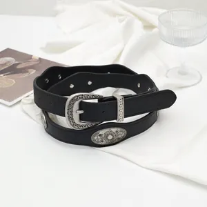 Vintage western black leather belt with ornate silver buckle and sunflower engravings
