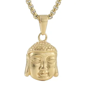 Detailed close-up of golden Buddha head pendant necklace with intricate texture
