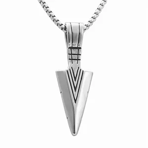 Detailed view of silver stainless steel spearhead pendant with box chain on white background