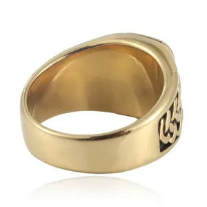 Vintage gold-plated stainless steel ring featuring embossed Celtic knot patterns