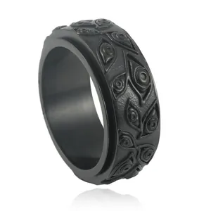 Rotatable black stainless steel ring with embossed eye patterns for men in punk style