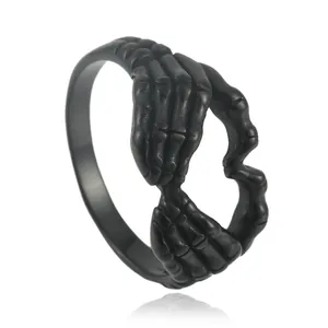 Gothic black skeleton hands ring forming a heart shape, made of punk stainless steel