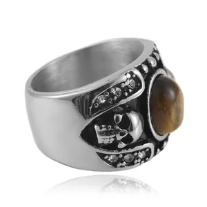 Anillo punk para hombre de acero inoxidable con piedra ojo de tigre marrón y calaveras