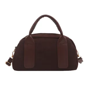 Vintage dark brown suede Boston bag with gold hardware and adjustable shoulder strap