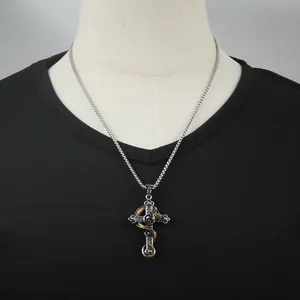 Gothic punk silver cross necklace with golden dragon pendant for men on model