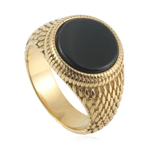 Vintage gold-tone stainless steel ring with round black stone and textured scales