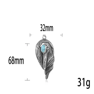 Ciondolo testa d'aquila in acciaio retrò con turchese, misura 68mm x 32mm stile punk