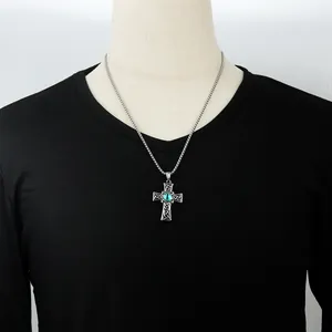 Punk vintage cross necklace in stainless steel featuring a blue cat-eye stone pendant