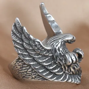 Vintage eagle ring in stainless steel with detailed feather texture and punk style