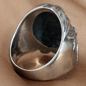 Retro punk skull ring in vintage stainless steel finish with eagle relief details