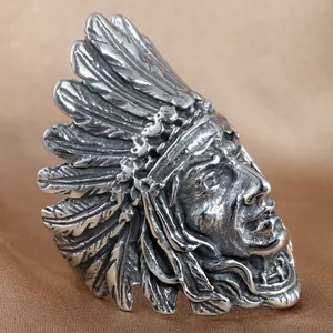 Vintage stainless steel Indian chief skull ring with feather headdress on brown silk