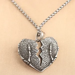Ciondolo a cuore spezzato in acciaio inox stile punk con dettagli ossei e catena
