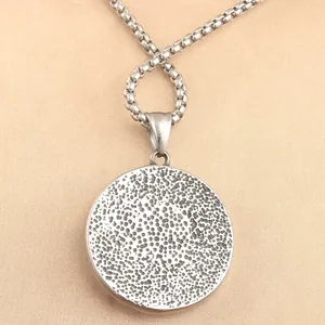 Punk style stainless steel tree of life pendant with textured finish on a box chain