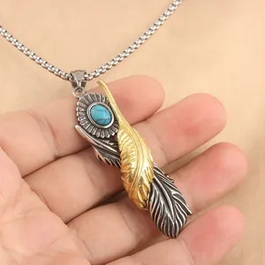 Punk vintage stainless steel feather pendant with gold accent and turquoise stone