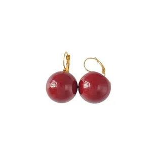 Retro oversized red pearl earrings with elegant golden geometric hooks for women