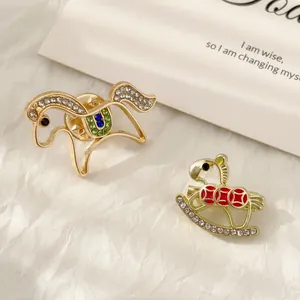 Exquisite gold-plated horse brooch set with inlaid crystals and colorful enamel details