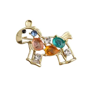 Exquisite gold-plated horse brooch with colorful gemstones and hollow design for New Year