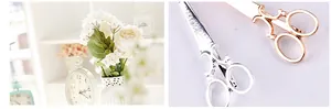 Makro-Detail von Haarspangen aus Legierung im Vintage-Scheren-Design in Silber und Roségold