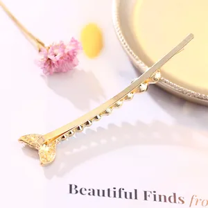 Elegante fermaglio per capelli a coda di pesce dorato con perle e strass lucidi