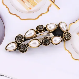 Vintage geometric BB clip with pearls and rhinestones on black fabric base