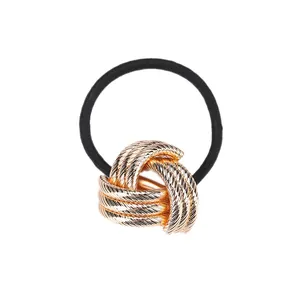Elastic black hair tie with a decorative gold woven metal knot for ponytails