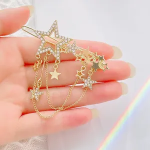 Elegant gold star hair clip with tassels and sparkling rhinestones for women
