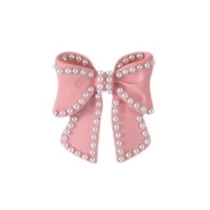 Elegant pink bow accessory with white pearls for car decor, hair clips or brooches