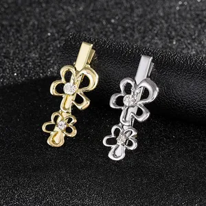 Pair of gold and silver floral rhinestone hair clips with minimalist metal design